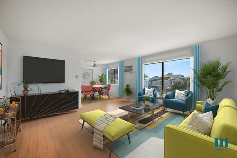 A living room with a yellow couch and a television on the wall.