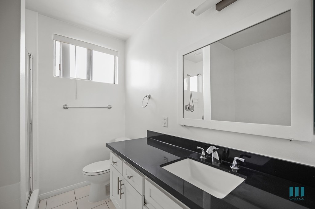 Bathroom with Stand-Up Shower and Vanity Cabinet Storage