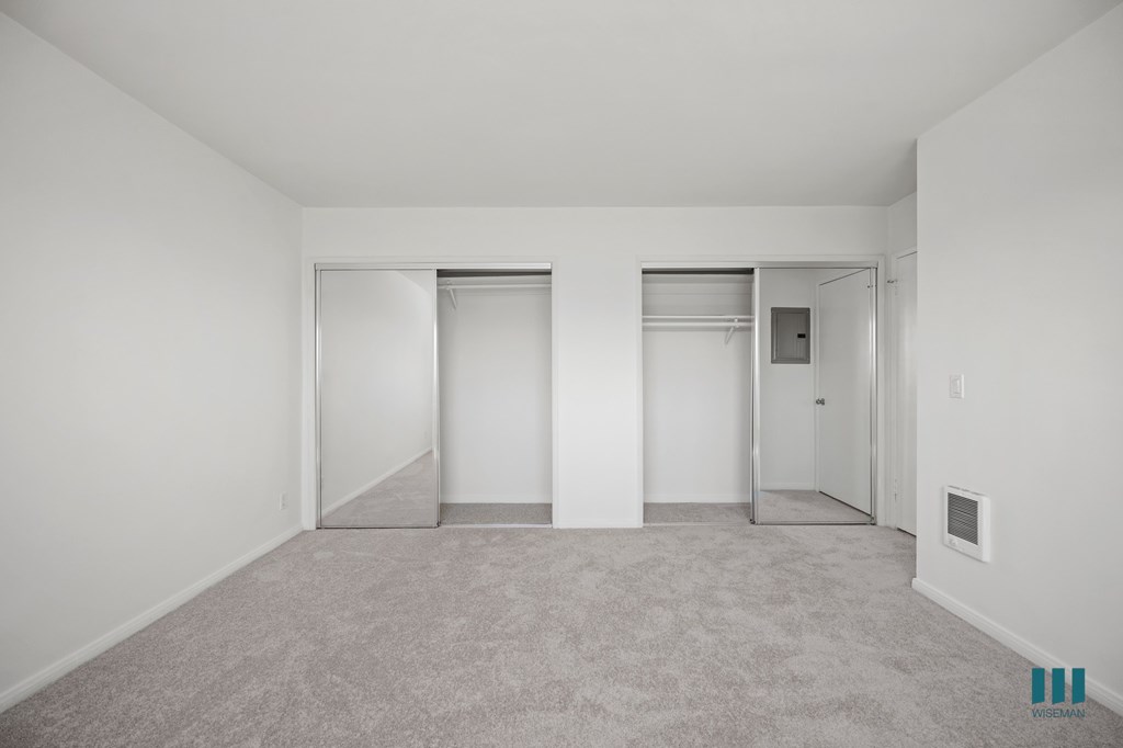 Bedroom with Two Mirrored Closets