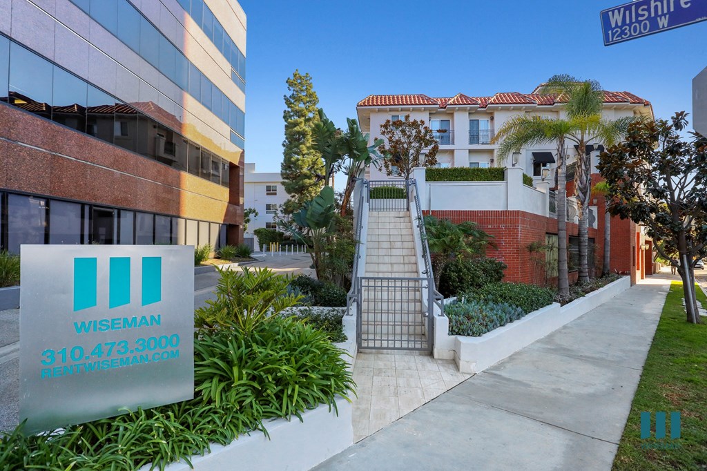 Sidewalk View of McClellan Corner by Wiseman