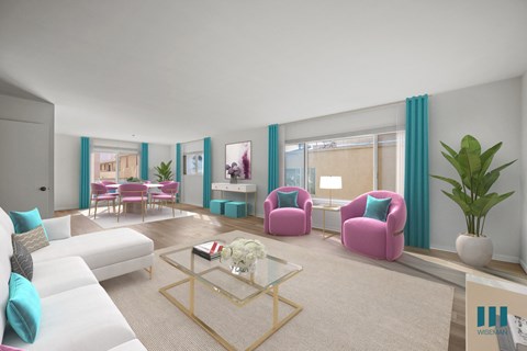 A living room with a white couch, pink armchairs, and a glass coffee table.