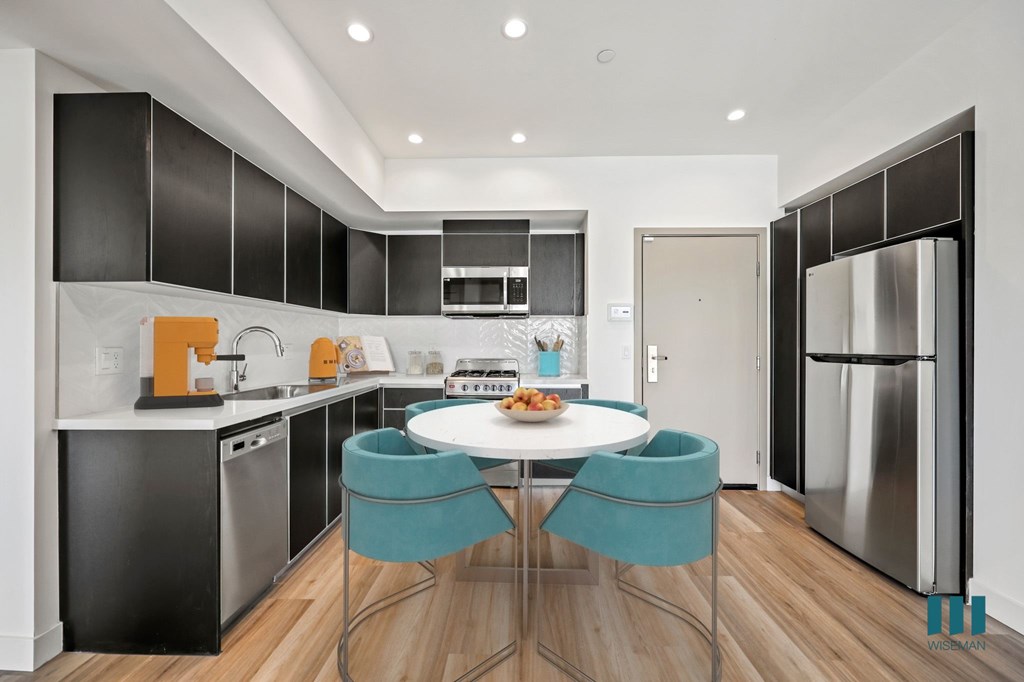 Kitchen with Stainless-Steel Appliances and Ample Cabinet Storage - Madison Floor Plan
