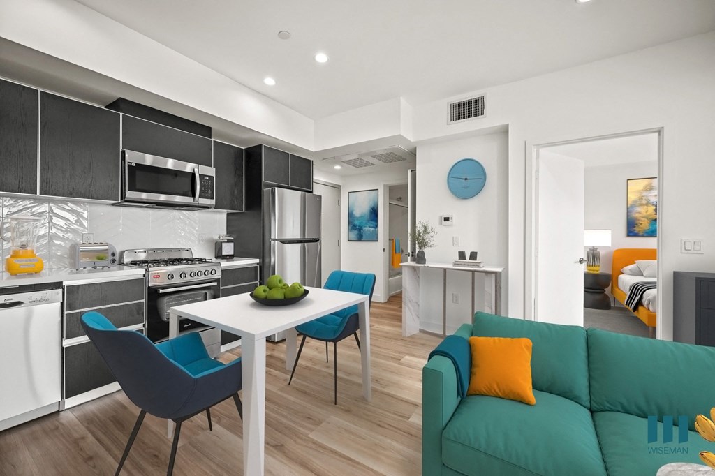 Full-Size Kitchen, Dining, and Living Room Space with Vinyl Flooring and Recessed Lighting - Overland Floor Plan