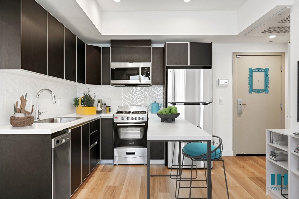 Open-Concept Kitchen with Stainless-Steel Appliances -Overland Floor Plan