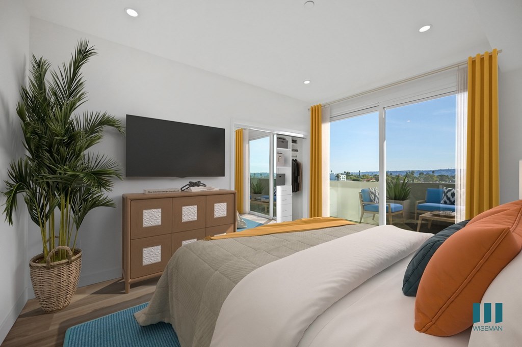 Bedroom with a Mirrored LCoset, Vinyl Flooring, and Patio Access - Aspen Floor Plan