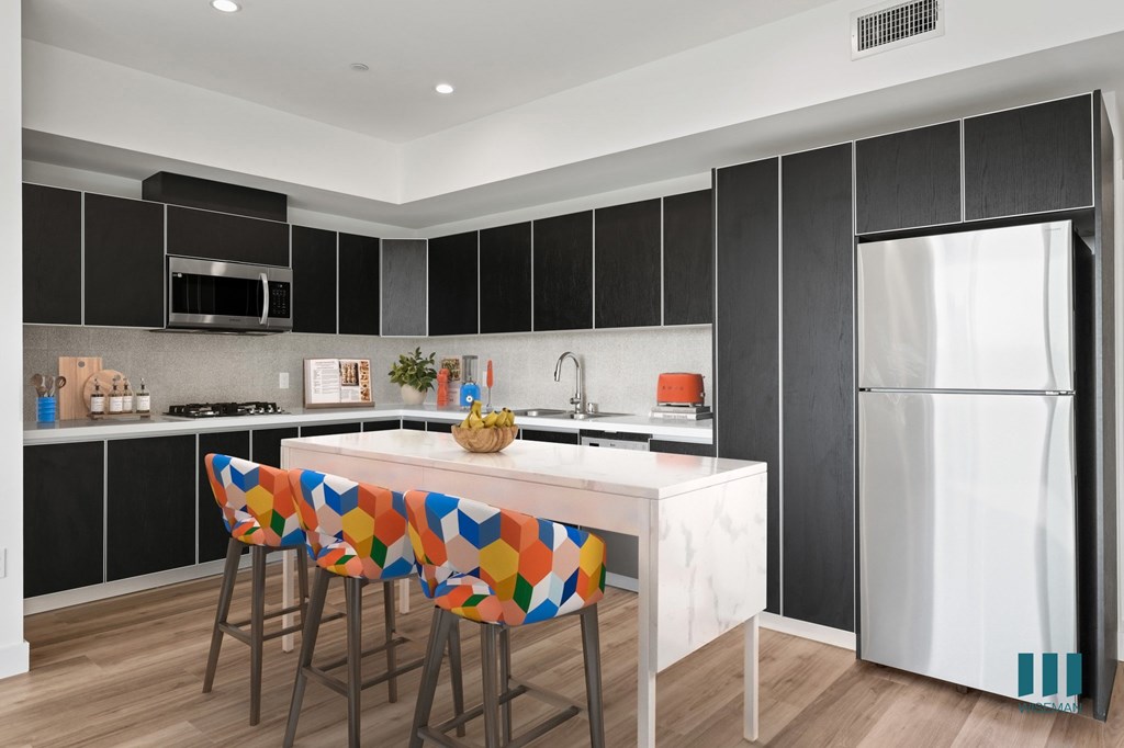 Open-Concept Kitchen with a Refrigerator, Mirowave Oven, Dishwasher, and Washer/Dryer - Aspen Floor Plan