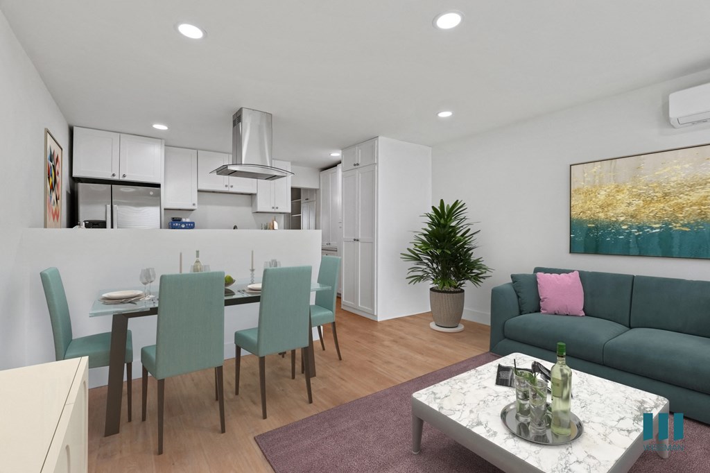 Open-Concept Kitchen, Dining, and Living Room with Vinyl Flooring and Recessed Lighting