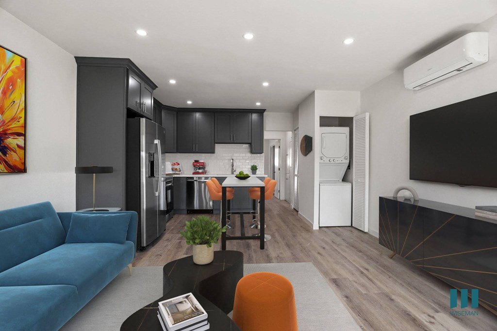 Kitchen, Dining, and Living Room with In-Suite Washer & Dryer