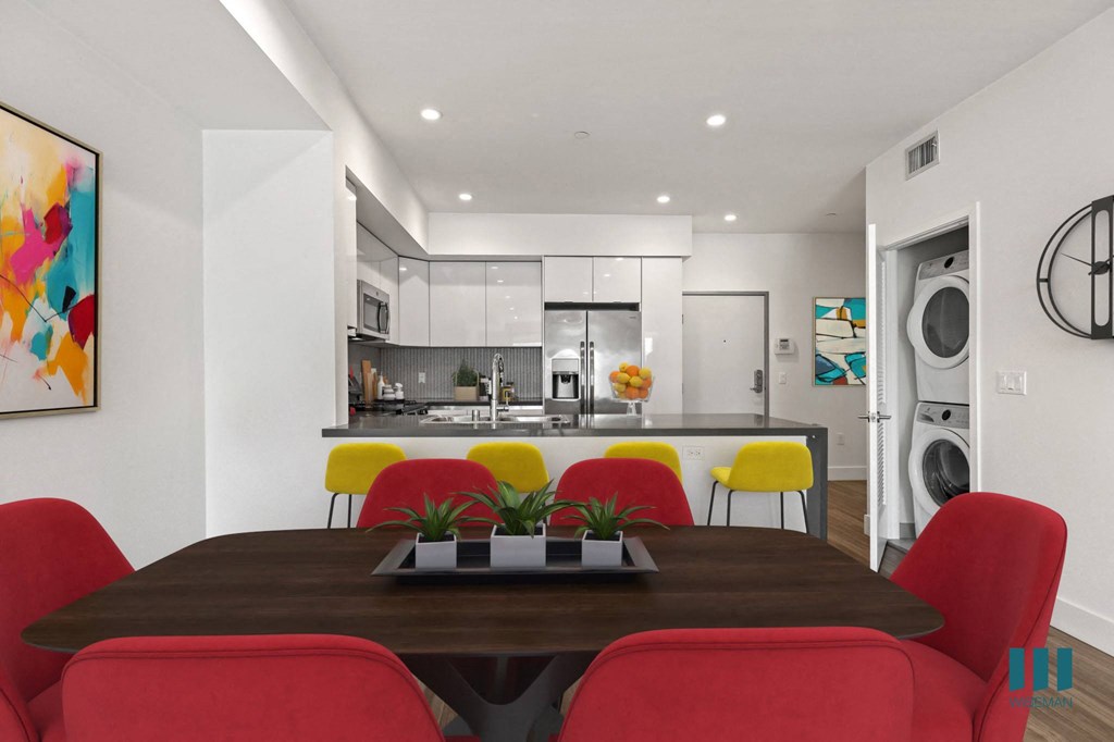 Open-Concept Kitchen with Countertop Bar and Dining Area Open-Concept Kitchen with Countertop Bar and Dining Area