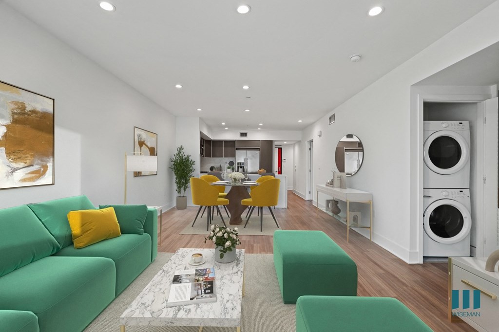 Kitchen, Dining, and Living Room Area with In-Suite Washer & Dryer