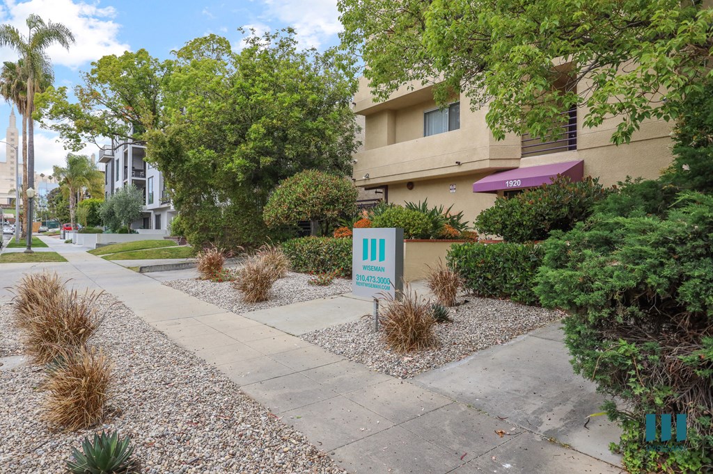 Sidewalk View of Overland Century by Wiseman