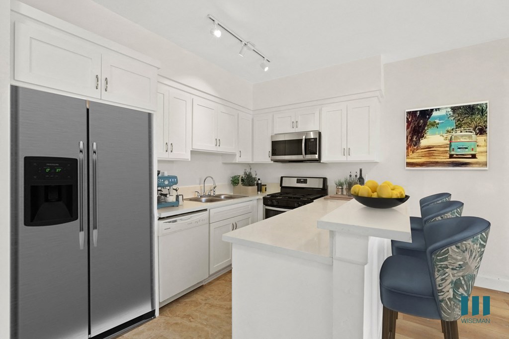 Kitchen with Stainless-Steel Dishwasher, Stove, and Microwave Oven