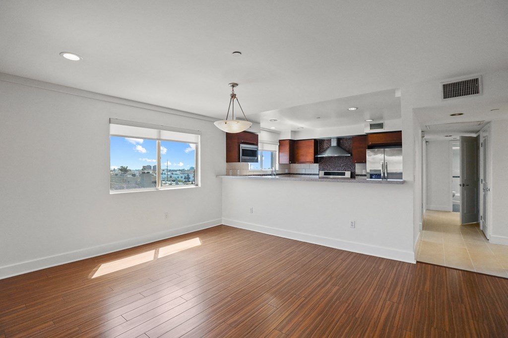 Open-Concept Kitchen, Dining, and Living Room Spaces