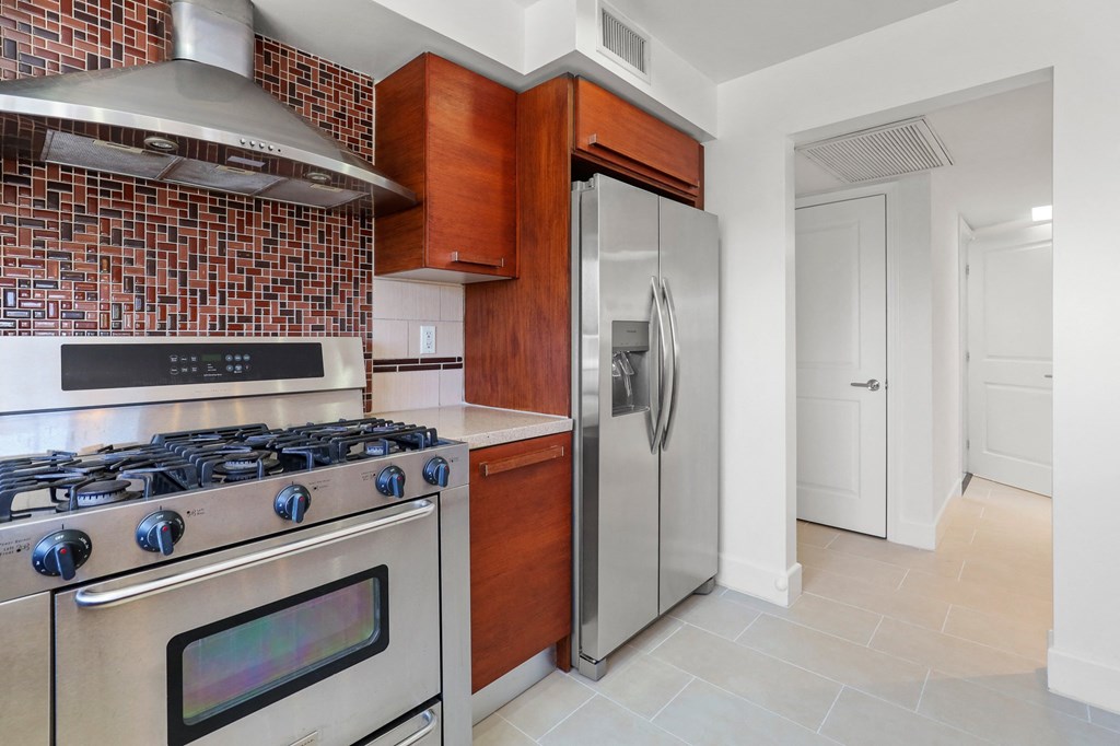Kitchen with Six Burner Stainless Gas Stove Cooktop