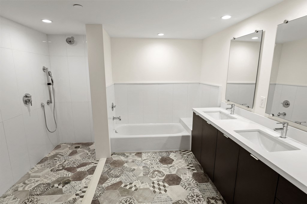 Master Bathroom with Double Sinks, Walk-In Shower, and Full-Size Bathtub
