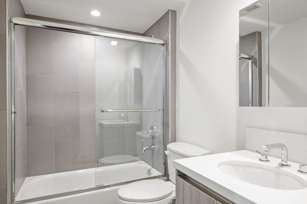 Bathroom with Bathtub with Glass Doors