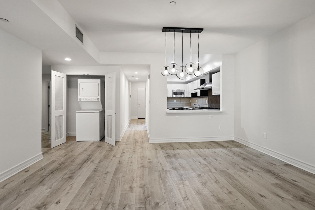 Open-Concept Kitchen and Dining Space and In-Suite Washer & Dryer