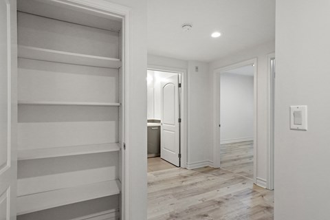 Hall Closet with Built-In Shelving