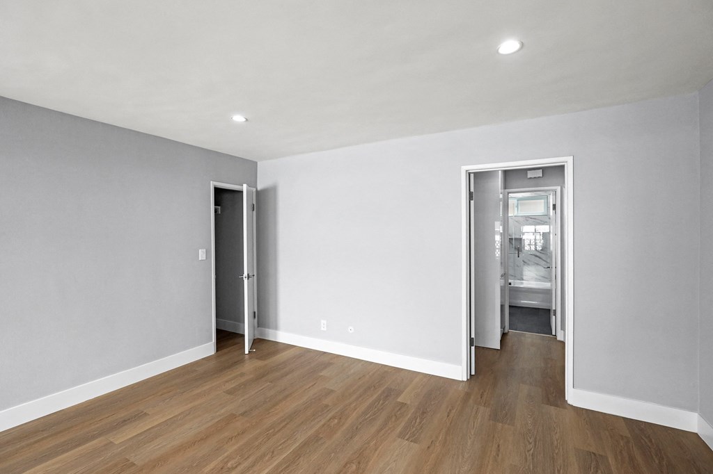 Bedroom with Vinyl Flooring and Bathroom
