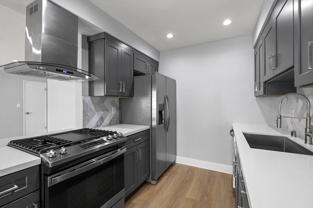 Kitchen with Stainless-Steel Refrigerator, Stove, and Dishwasher