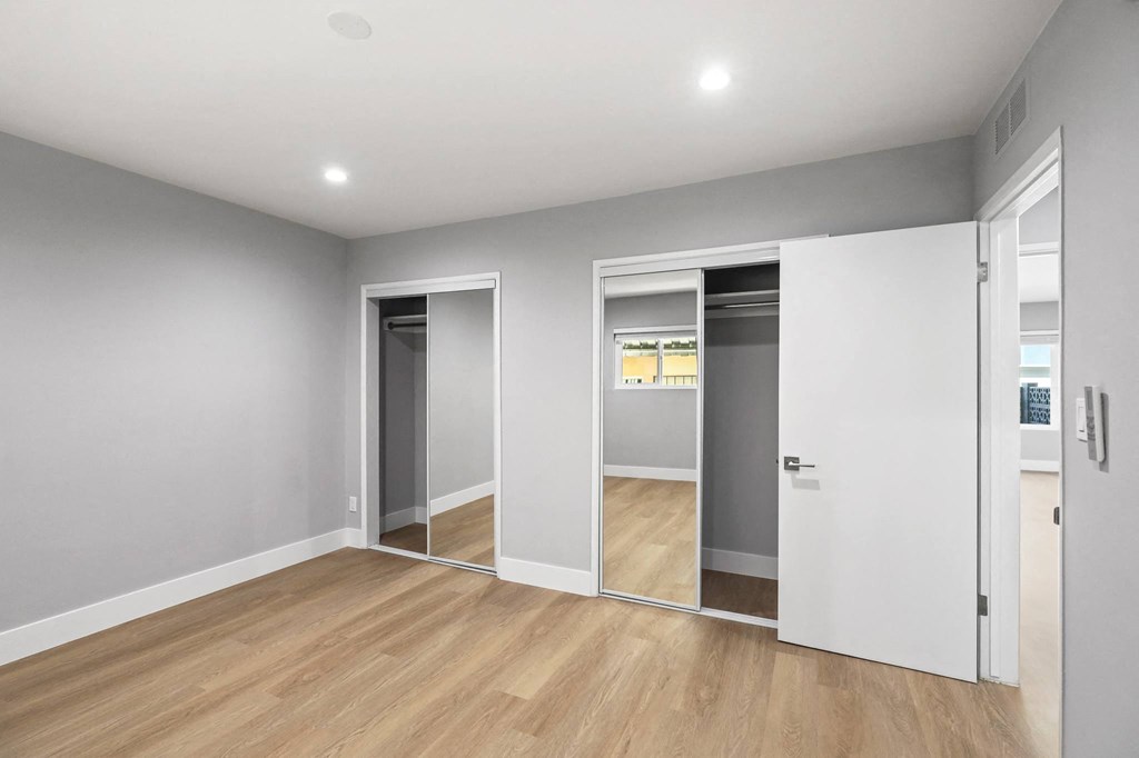 Bedroom with Two-Mirrored Closets