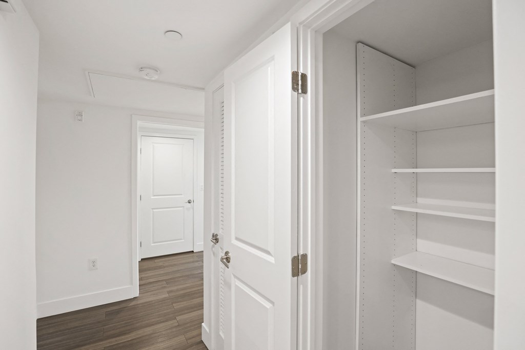 Hallway Storage Closet with Shelving
