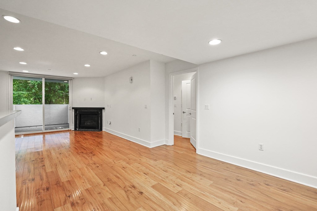 Dining and Living Room Spaces with Access to Patio