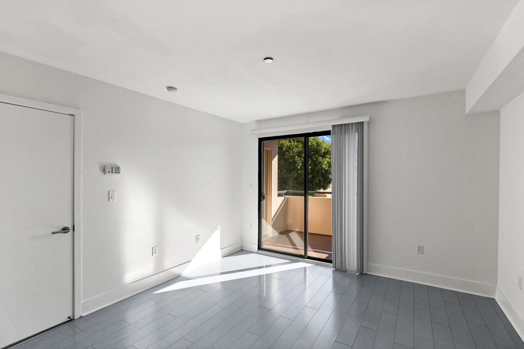 bedroom with balcony access