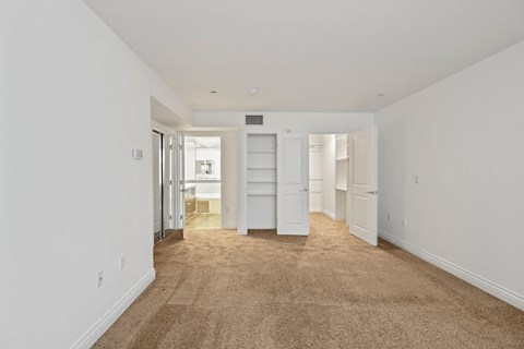 Bedroom with Bathroom, Closet with Shelving, and Large-Size Mirrored Closet