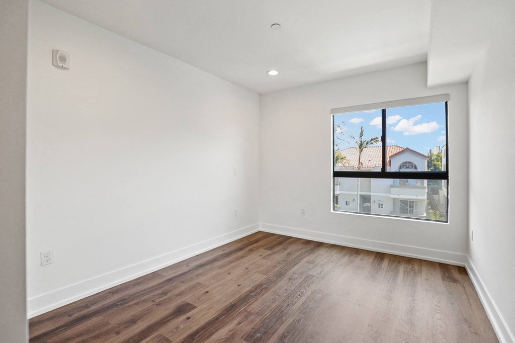 Large-Sized Bedroom with Window and Vinyl Flooring