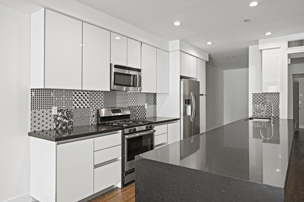 Kitchen with Stainless Steel Appliances and Ample Cabinet Storage
