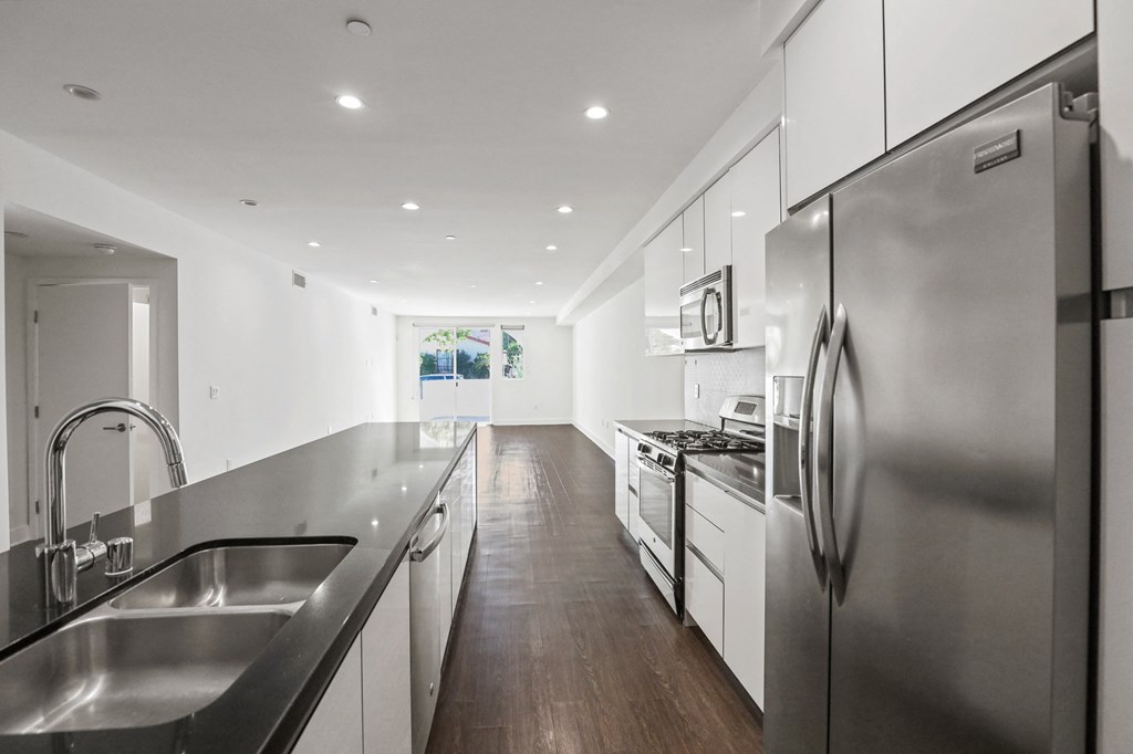 Open-Concept Kitchen, Dining, and Living Room Areas