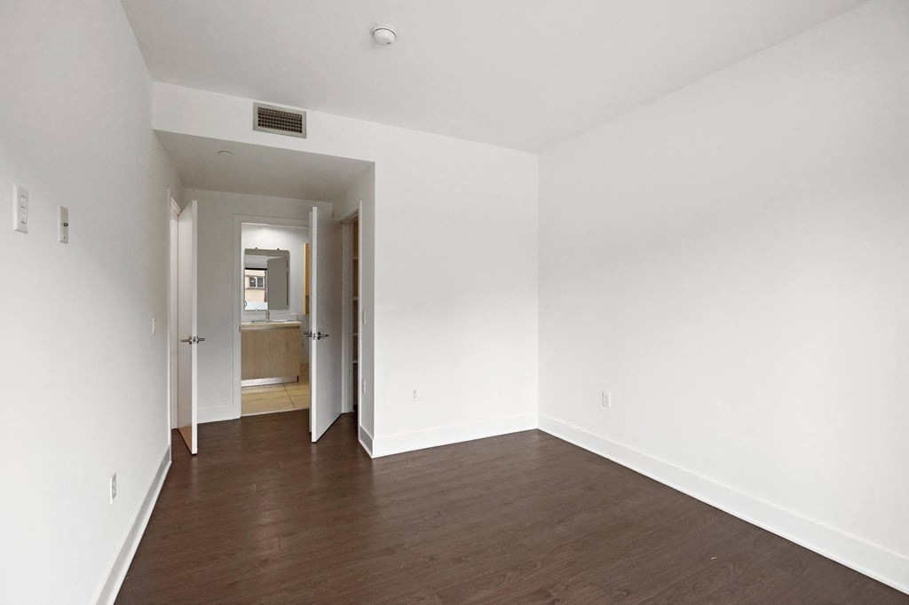 Bedroom with Walk-In Closet and Bathroom