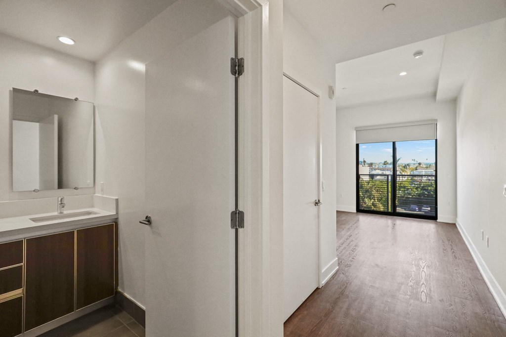 Master Bedroom with Bathroom, Vinyl Flooring, Recessed Lighting, and Balcony
