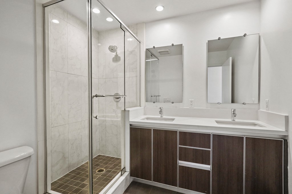 Bathroom with Double-Sink Vanity and Walk-In Shower