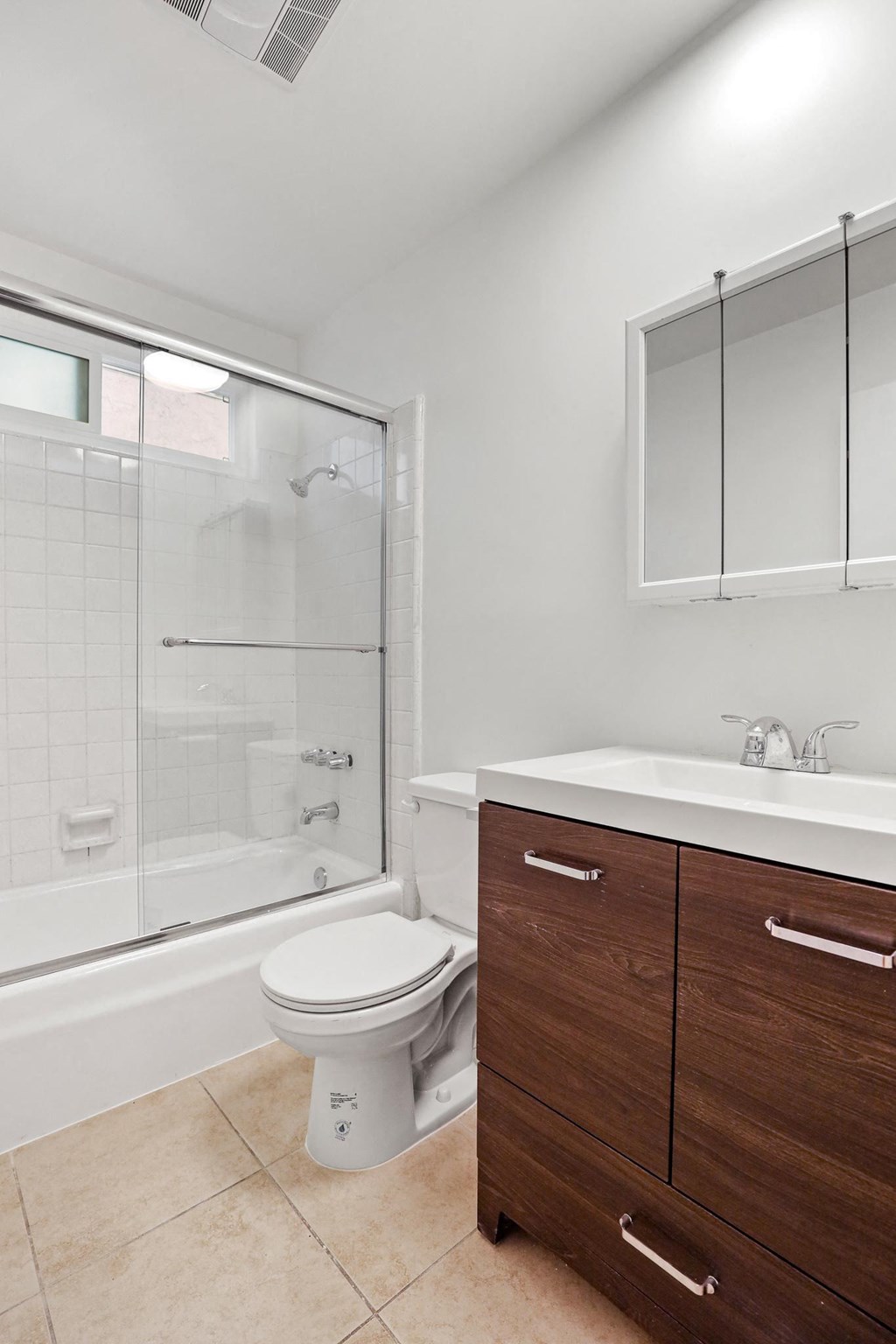 Bathroom with Bathtub and Vanity with Cabinet and Drawers
