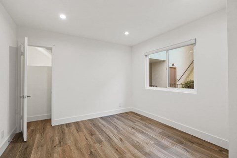 Bedroom with Recessed Lighting and Window