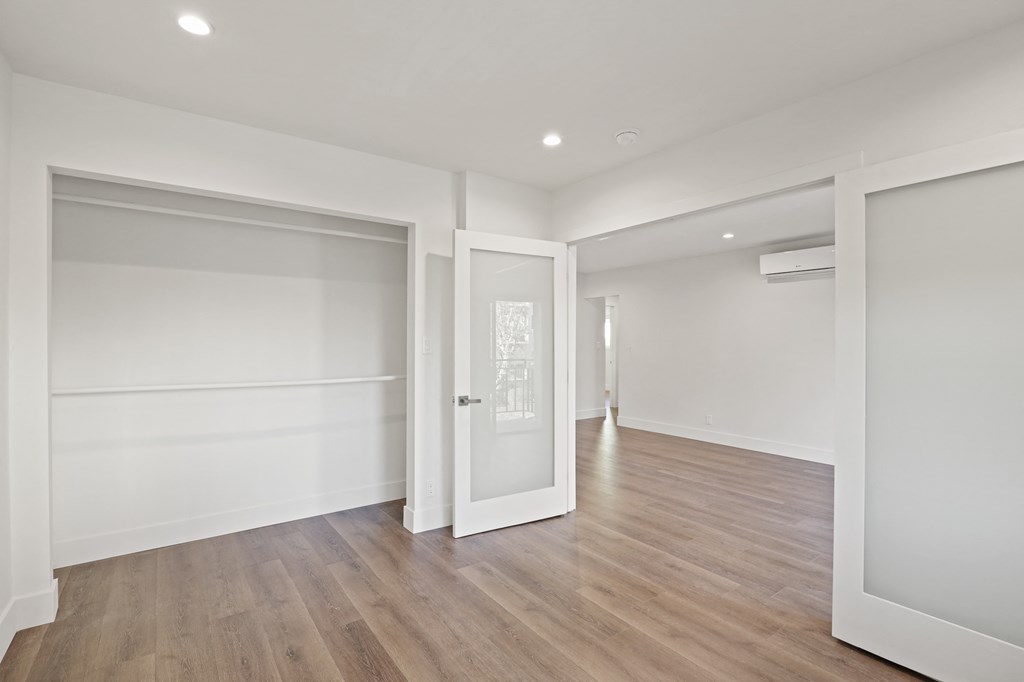 Apartment Bedroom with Double Entry Doors and Large Closet