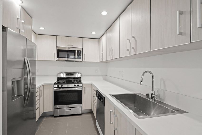 Kitchen with Energy-Efficient Appliances and Lots of Cabinet West LA apartment Kitchen with Energy-Efficient Appliances and Lots of Cabinet