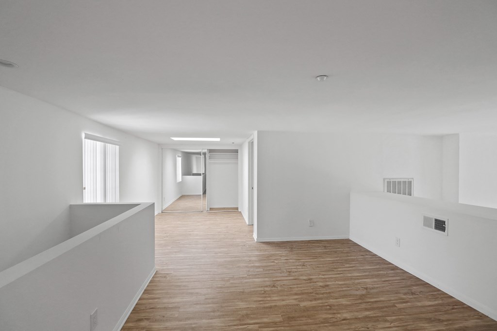 Spacious Loft with Vinyl Flooring, Mirrored Closet, and Patio