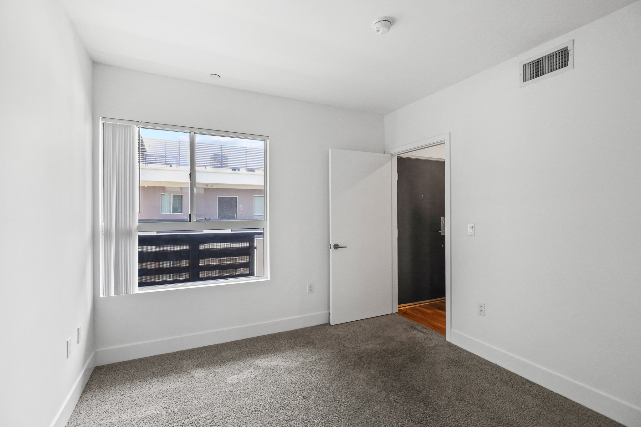 Bedroom with Courtyard Facing Window
