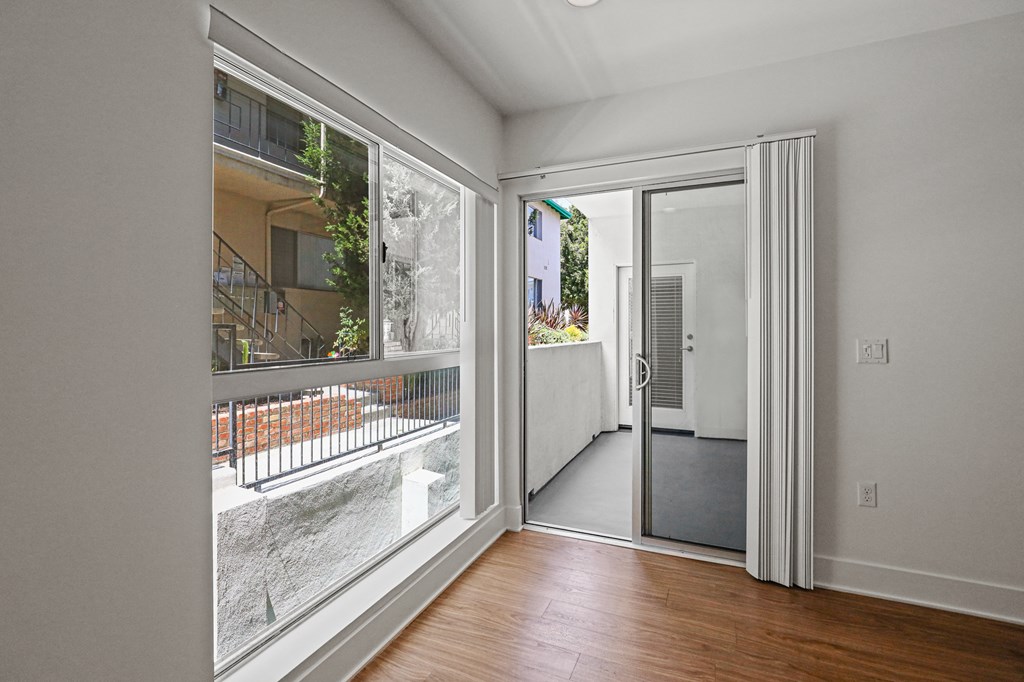 Large Living Room Windows and Spacious Patio