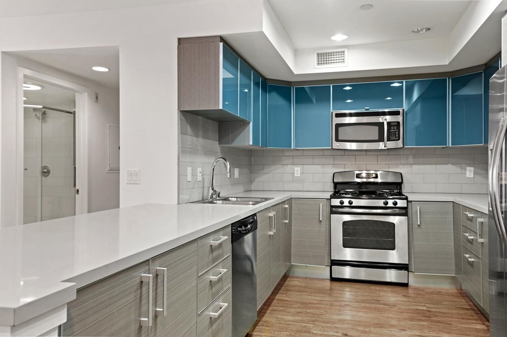 Full-Size Kitchen with Ample Cabinet Storage and Energy-Efficient Appliances