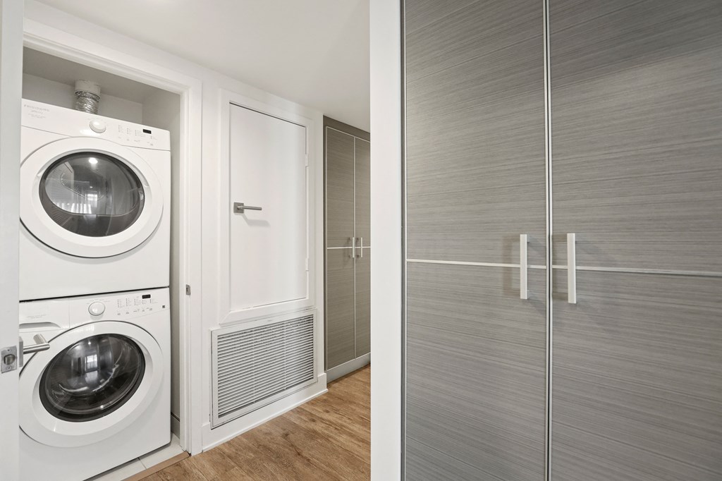 In-Suite Full-Size Washer & Dryer and Large Size Cabinet Storage