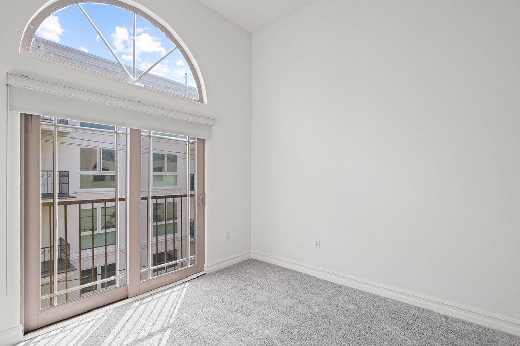 Bedroom with Balcony and Double Doors