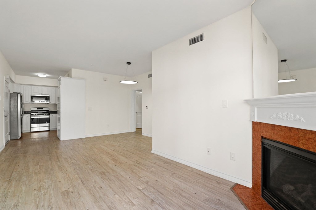 Open-Concept Dining and Living Room with Electric Fireplace