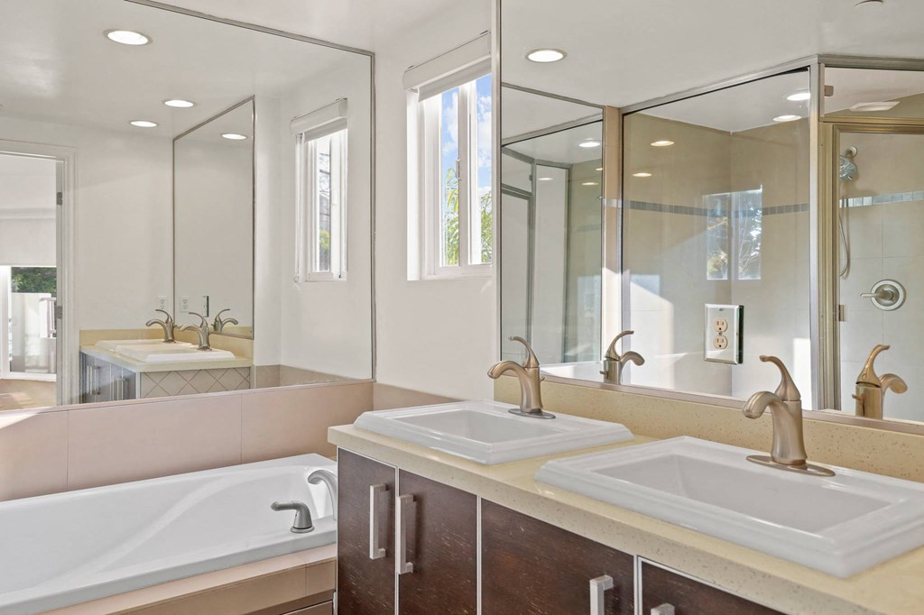 Bathroom with Stand-Up Shower, Full Size Bathtub, and Double Sinks