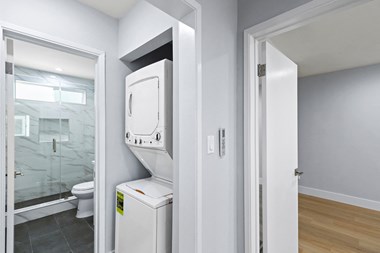 In-Suite Washer & Dryer and Bathroom - Photo Gallery 3