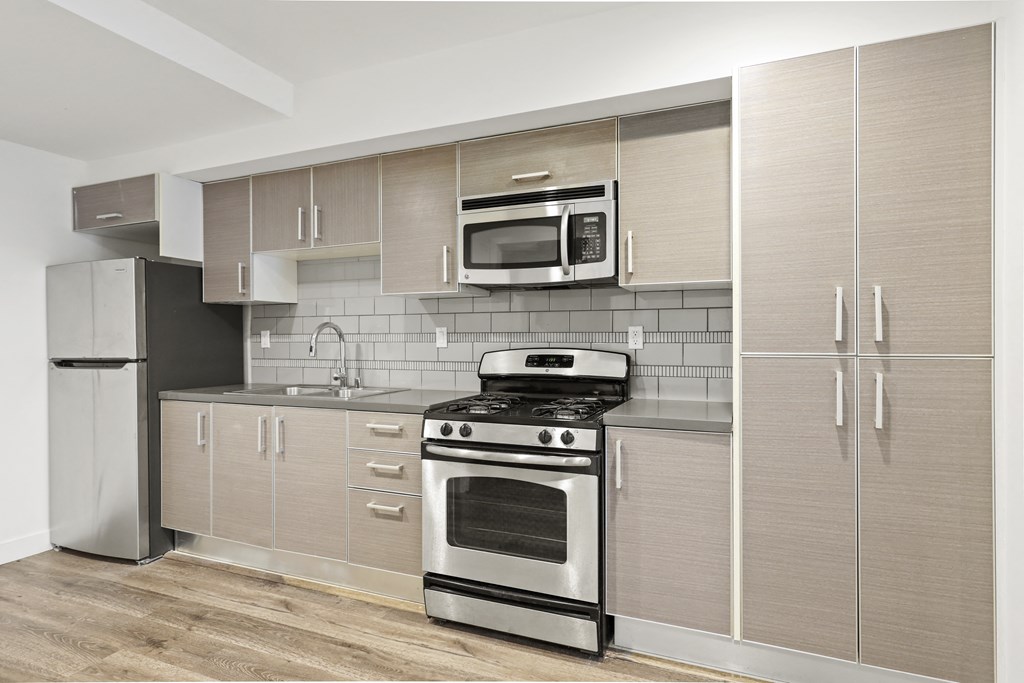 Kitchen with Stainless Steel Appliances and Ample Cabinet Storage
