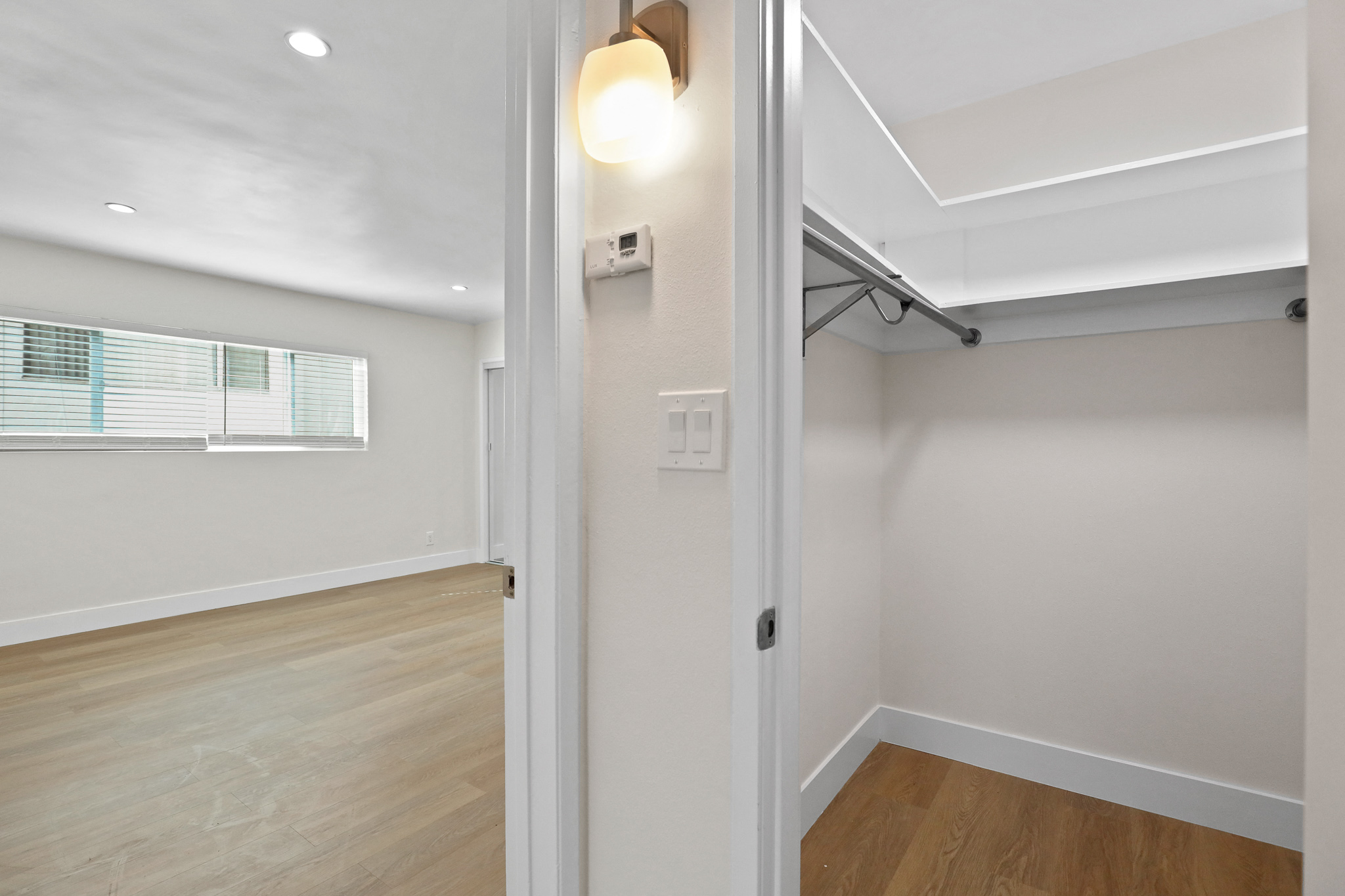 Walk-In Closet with Built-In Shelving